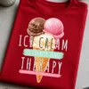 T-Shirt mit Eis-Motiv und dem Spruch ICE CREAM IS CHEAPER THAN THERAPY